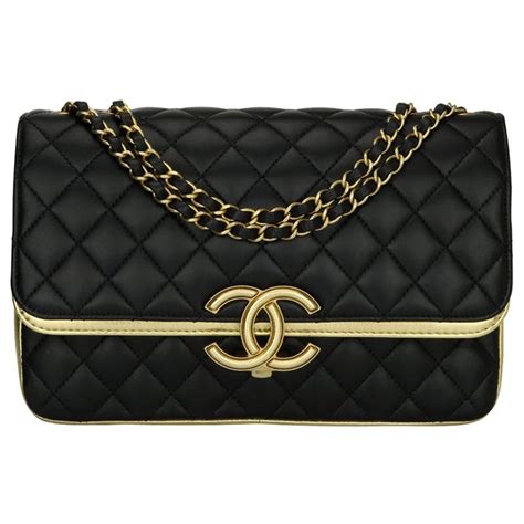 chanel black and gold purse